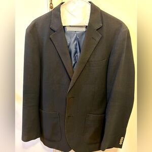 Black unstructured sport coat.